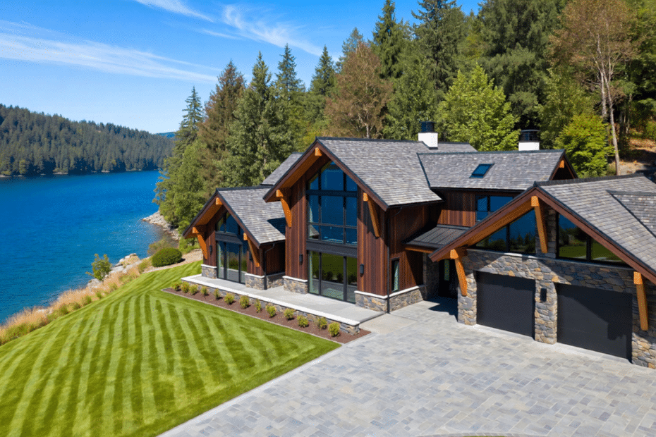 Luxury prefab homes in Kawartha Lakes featuring a modern custom design with large windows and lake views