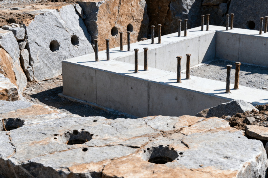 Granite excavation and foundation anchoring on Canadian Shield bedrock showing how you can build on granite in Muskoka